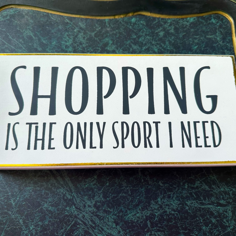 Quill to Paper “Shopping is the Only Sport I Need” sign